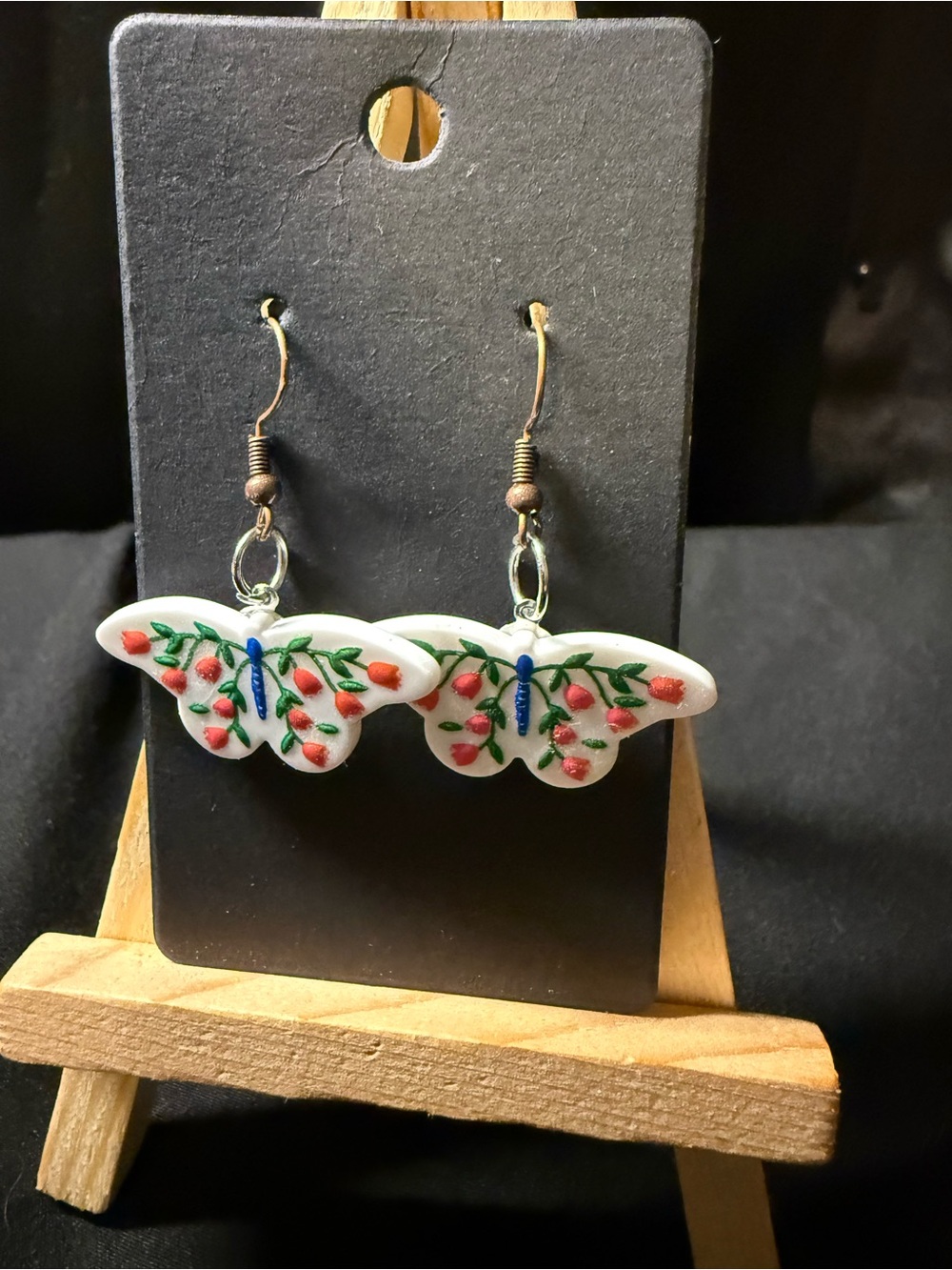 White Butterfly Drop Earrings with Pink Floral Accents